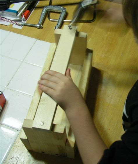 The cub scouts learn how to use a hammer saw glue gun and sanding block. Cub Scout Project: Wood Tool Box: 15 Steps (with Pictures)