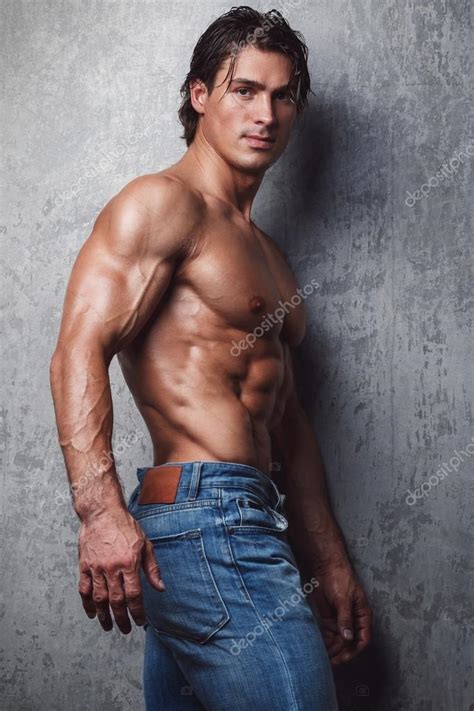 Мускулистый человек в джинсах: стоковая фотография © AY_PHOTO | Cкачать ...