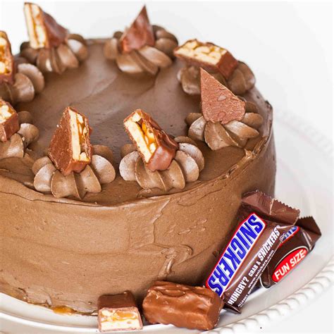 Snickers is a brand name chocolate bar made by the american company mars, incorporated, consisting of nougat topped with caramel and peanuts that has been enrobed in milk chocolate. Snickers Cake - Jenice Hays