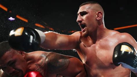 Justis huni punches faiga opelu in his way to victory in their australian heavyweight title bout. Justis Huni storms to Australian heavyweight title on destructive professional debut | Boxing ...