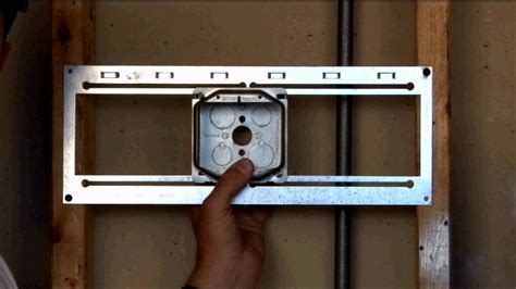 Align the bottom of the electrical box on your mark and hold the small piece of drywall against the front face of the stud. Sliding Box Bracket Mounting Bracket BMB16SL - YouTube