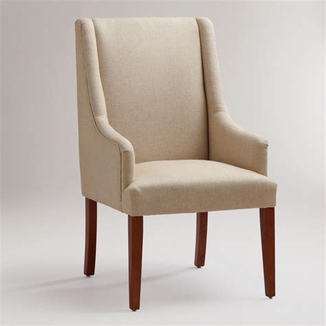 Its expertly tailored upholstered seat, and back are covered in a neutral tone durable textured linen which showcases well against the bronze metal base. Linen Hayden Dining Chair | World Market | Dining chair ...