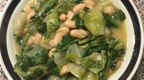 The week we found escarole in our farm share box, our local farmer's mother sent me the recipe for her awesome white bean and escarole soup. Escarole and Beans Recipe - Allrecipes.com