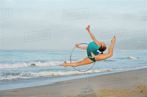 We were celebrating my parents' 30th wedding anniversary and even though i was fresh out of the shower and wrapped in a towel, they wanted a picture. beach gymnast