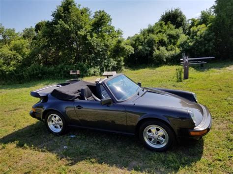 This black 1984 porsche 911 carrera 3.2l h6 f 5 speed manual is no longer in our inventory. 1984 PORSCHE 911 CARRERA CABRIOLET WITH ONLY 43K ORIGINAL ...