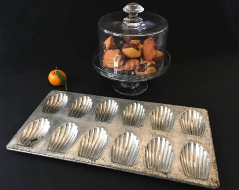 Cut the butter in tablespoons and place them in a heavy saucepan over medium heat. Madeleine Pan Moule à Madeleines Vintage French Madeleine ...