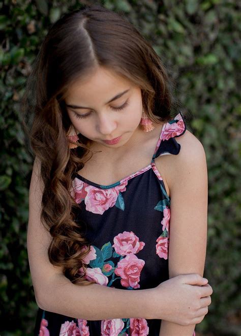 A shorter height should not stand in your way of becoming a model. Aurelia Romper in Black Floral | Cute girl dresses, Little girl models, Petite outfits