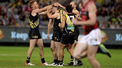 The essendon football club, nicknamed the bombers, is a professional australian rules football club based in the northern melbourne suburb of melbourne airport that plays in the australian football league (afl), the sport's premier competition. Richmond Tigers vs. Essendon Bombers | AFL Live Scores