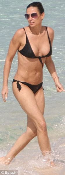 Now it can be told: Demi Moore recreates her Charlie's Angels bikini scene six ...