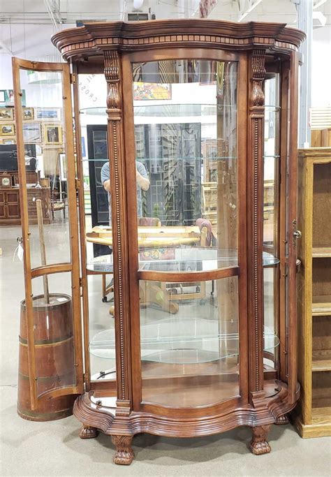 Traditional, contemporary and transitional in a wide range of bedroom, dining, accent and display cabinets. Lot - Pulaski Furniture Illuminated Curved Curio Cabinet