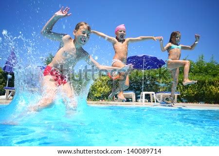 This movie nailed going to that friends house who's family did everything weird. Two Little Girls And Boy Fun Jumping Into The Swimming ...