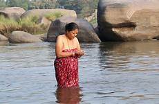 indian river bath woman taking india