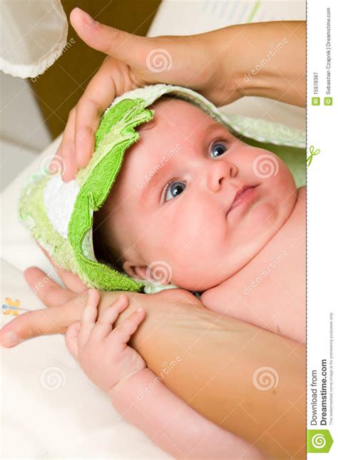 Baby bath can be exciting and stressful at the same time. Baby after bath stock image. Image of robe, soft, baby ...