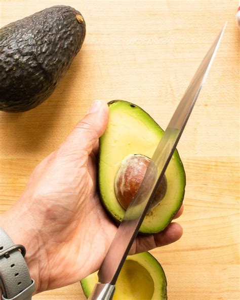 Dice up the seed (it should be soft enough). How to Cut an Avocado | Blue Jean Chef - Meredith Laurence