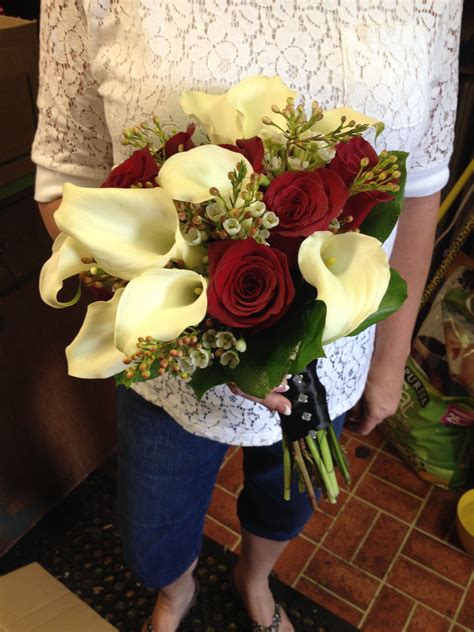 Some right reserved, and if the copyright of photo in this site is belongs to you, and then you want to. Bridal bouquet of mini calla lilies and red roses accented ...