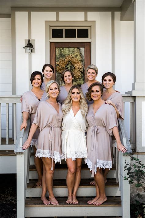 Gorgeous blonde bride getting dressed. 48 Fabulous Bridesmaids Robes Wedding Ideas That You Need ...