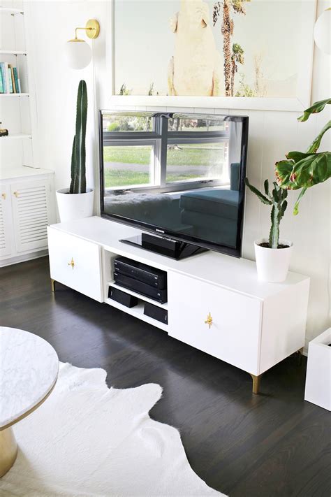 Ikea Restyle: Mid Century TV Stand - A Beautiful Mess Ikea products can solve a great many organizational issues in the home, and be none to visually offensive in the process.