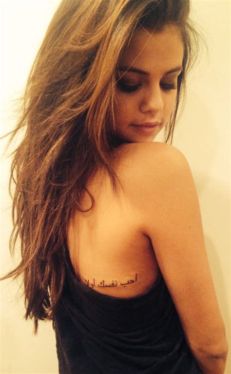 The polaroids and the all of which is to say, selena has some cool tattoos, including giant prayer hands on her thigh, some music. PHOTO The meaning of Selena Gomez's Arabic tattoo