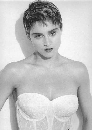 Marilyn monroe short curly hair. 1987. Loved Madonna's look with the short hair and red ...