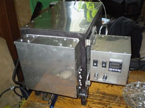 Homemade heat treating oven constructed from angle iron, sheetmetal, and firebricks. Homade heat treat oven - The Knife Network Forums : Knife ...