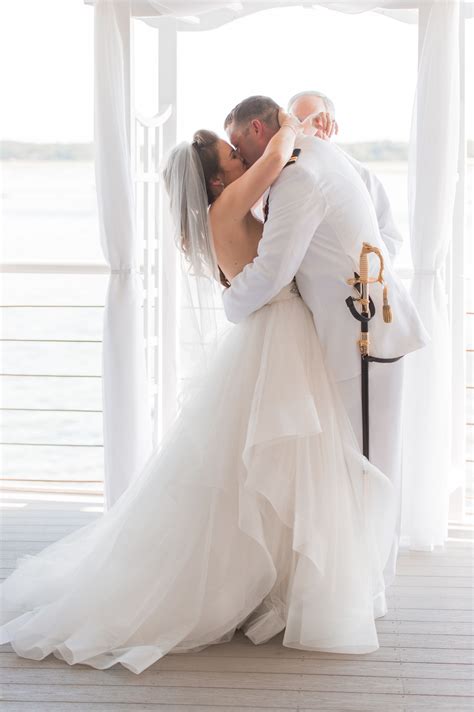 Check spelling or type a new query. Bride and groom share their first kiss as husband and wife ...