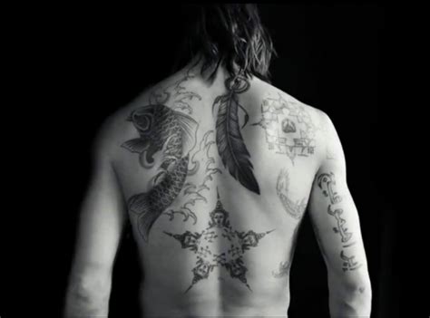 In the center bottom part of the back he has a sign that is made up of five buddha heads. Tattoos Zlatan Ibrahimovic
