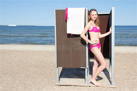 Green changing cabins on the beach in greece in the morning. Slim Beautiful Woman In Changing Cabin On The Beach Stock ...