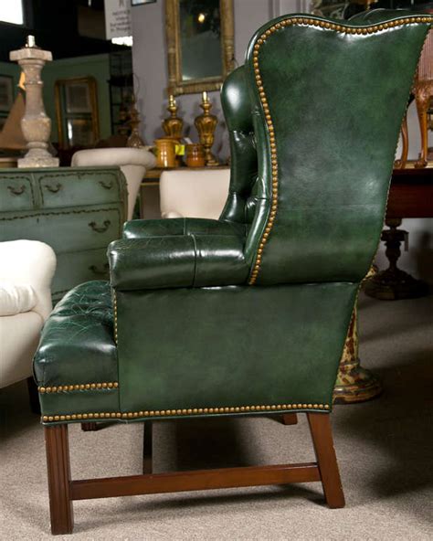 Great savings & free delivery / collection on many items. 1950's Green Leather Tuffted Wing Chairs and Bench at 1stdibs