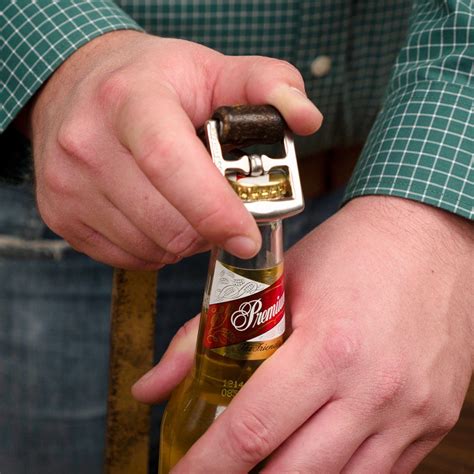 Tuck the lighter so that the edge is under the teeth of the bottle cap. 10 Different Ways to Open a Beer Bottle without a Bottle ...