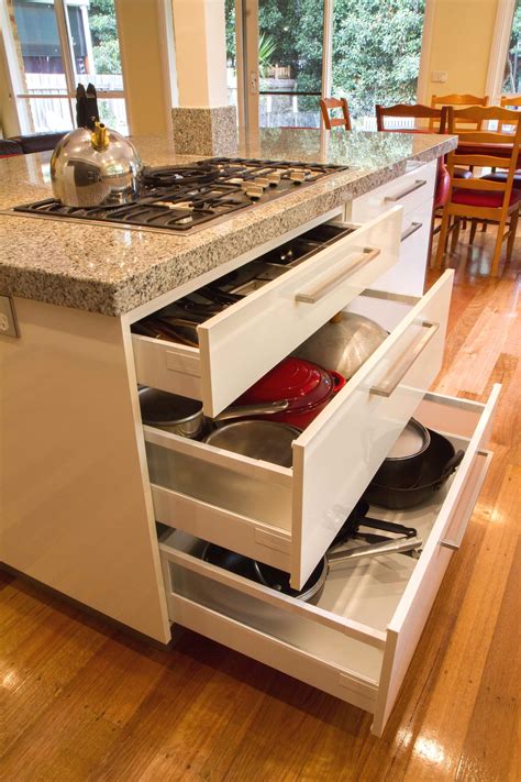 Add interest—and extra storage to your kitchen island with convenient kitchen island cabinets. Pin on Hom