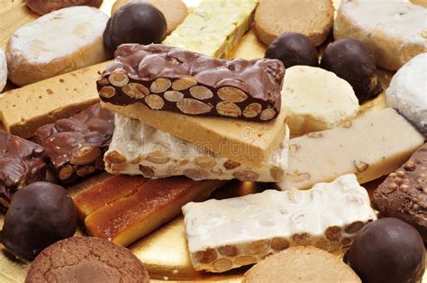 Four of the most popular christmas desserts, found in almost every household are turrón, polvorones, mazapan, and mantecados, each described below. Polvorones And Christmas Desserts Stock Image - Image of ...