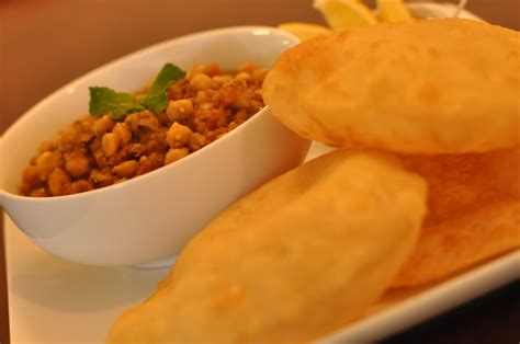 Is it possible to make chole bhature at home? Spice Infused: Mint Chole with Homemade Bhature