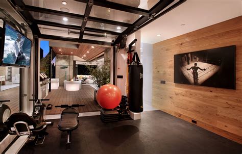 Most garages are already designed with open floorplans, which is the perfect setting for a gym. Garage conversion | Home gym flooring, Home gym decor, Gym room