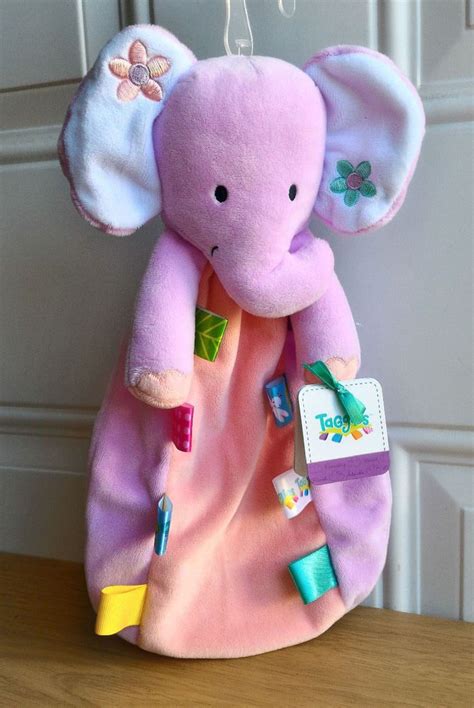 Designed to help keep a baby warm and comfortable made of soft 100% polyester boys' clothing. NWT Taggies Purple Elephant Plush Rattle Baby Gril ...