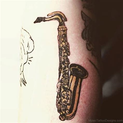 Guitar tree tattoo creative design @needle_trace_tattoo_taiwan. 77 Excellent Saxophone Tattoos
