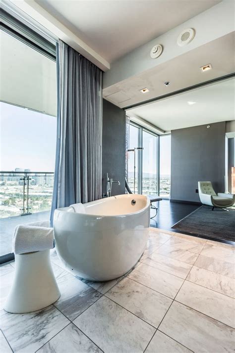 Bathrooms are also outfitted with bathrobes, slippers, and designer toiletries. Luxury Condo, 1 Bedroom - Deep Soaking Bathtub | Luxury ...