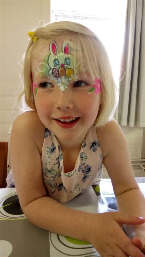 If necessary this design could be done very fast, just painted on the forehead with a light outline and a quick flower in the center. Easter bunny face paint | Bunny face paint, Face paint, Face