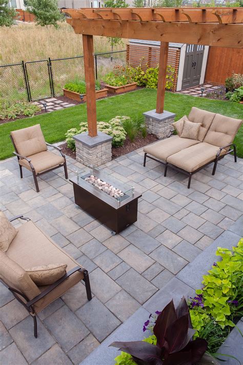 What about sand in the sub base? A relaxing patio made up of Navarro pavers | Backyard ...