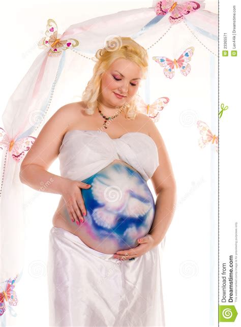 This can bring about good sleep. Pregnant Woman With Body-art With Littlle Dragon Stock ...