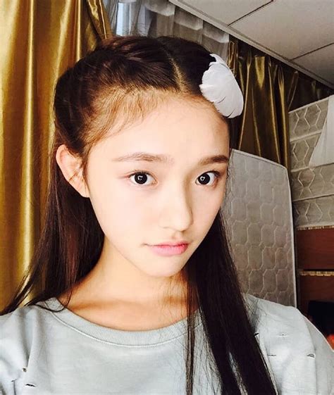 She is fairly pretty with fair skin, rosy cheeks, a delicate nose, and two dimples when she smiles. Lin Yun