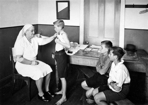 The physical examination is typically the first diagnostic measure performed after taking the patient's history. Queensland State Archives 2837. Medical examination with ...
