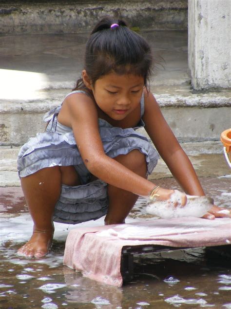 #photography #windmill #water #nature image by little nobody. Little girl washing clothes. | Temple district, Bangkok ...