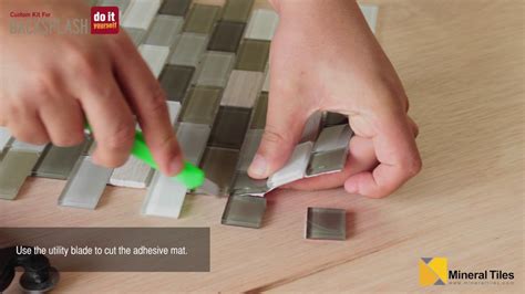 Check out make your own backsplash. DIY Peel & Stick Glass Tile Backsplash Kit - YouTube