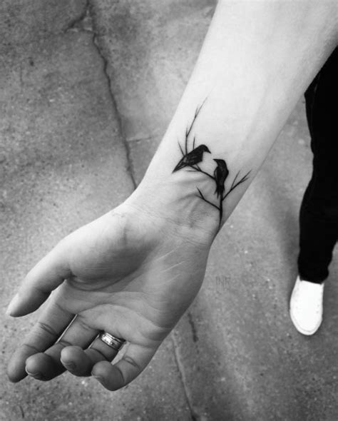 Music tattoo on both wrists. 50 Amazing Wrist Tattoos For Men & Women - TattooBlend