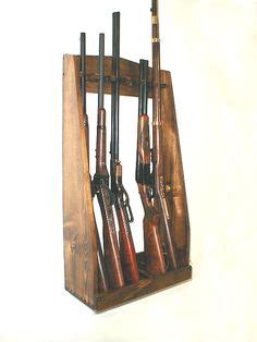 The gun rack is suitable for easy storage of rifles and shotguns during hunting season, and the rifle sling can be as simple or as intricate as you like. Wall Gun Rack Plans - WoodWorking Projects & Plans | Vertical Gun Rack Ideas | Woodworking, Guns ...
