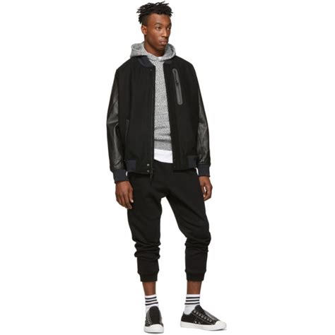 Pull on a gold bomber jacket from our collection for an instant guys, make your jacket pop by layering a plain black tee underneath with ripped jeans. NikeLab Black NRG ESS Destroyer Bomber Jacket NikeLab