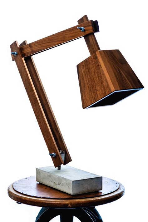 This stunning table lamp is the perfect finishing touch to illuminate any room in your home on its own or in a pair. Major John | The Desk lamp is made from Namibian Teak ...