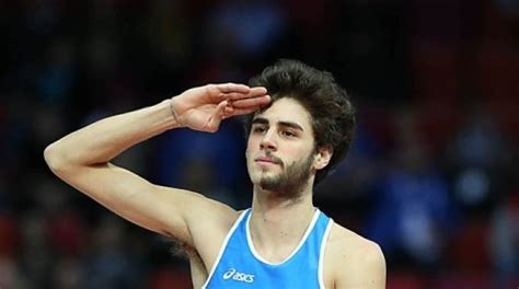 Italian athlete gianmarco tamberi sports a beard on only half his face, believing that it brings him good luck. vannizagnoli.it, atletica, salto in alto, gianmarco ...