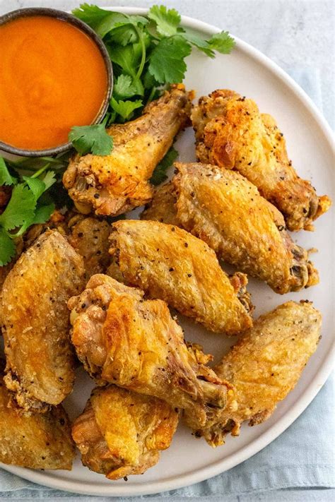 Chicken wings take about 40 minutes to bake until they're nice and crispy at 425 f degrees. Baked Chicken Wings - Jessica Gavin | Recipe | Chicken ...