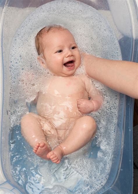 Gather the supplies you'd use for a sponge bath, a cup of rinsing water and baby shampoo, if needed, ahead of time. This is how often you should bathe your kids - and the ...